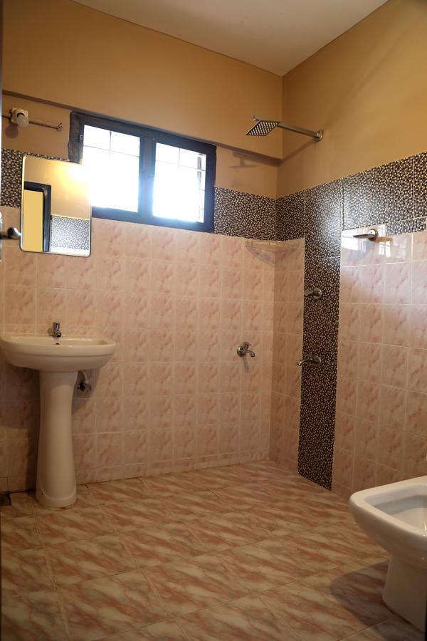 Puthens Clifton Inn Котаям Екстериор снимка