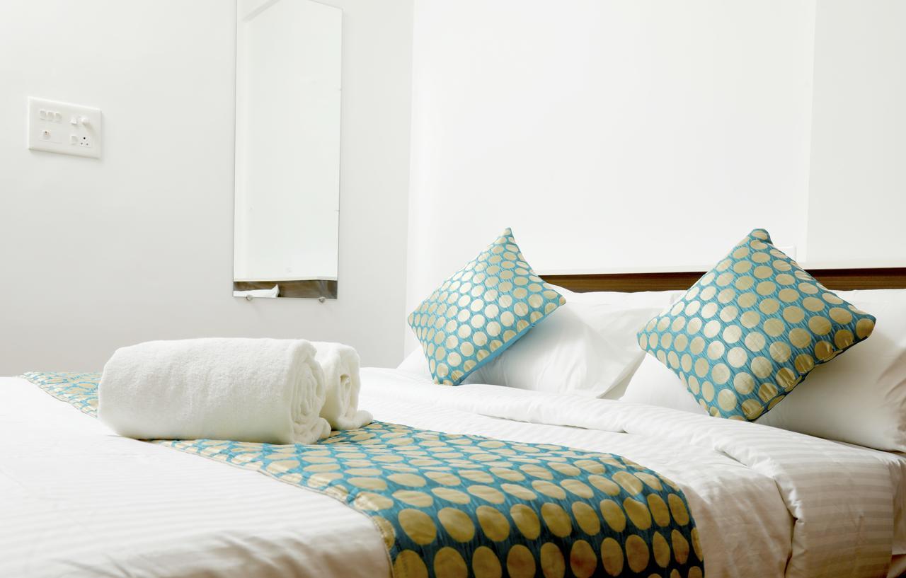 Puthens Clifton Inn Котаям Екстериор снимка