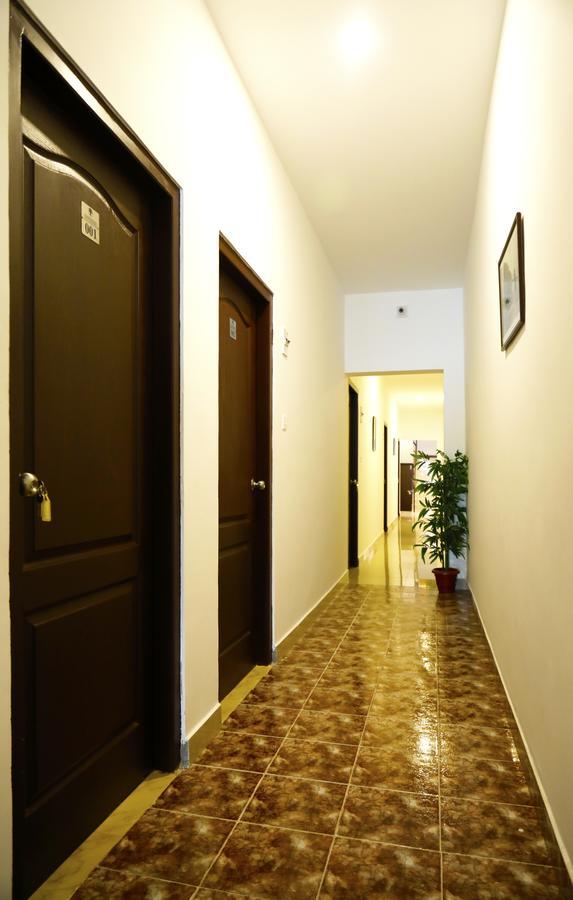 Puthens Clifton Inn Котаям Екстериор снимка