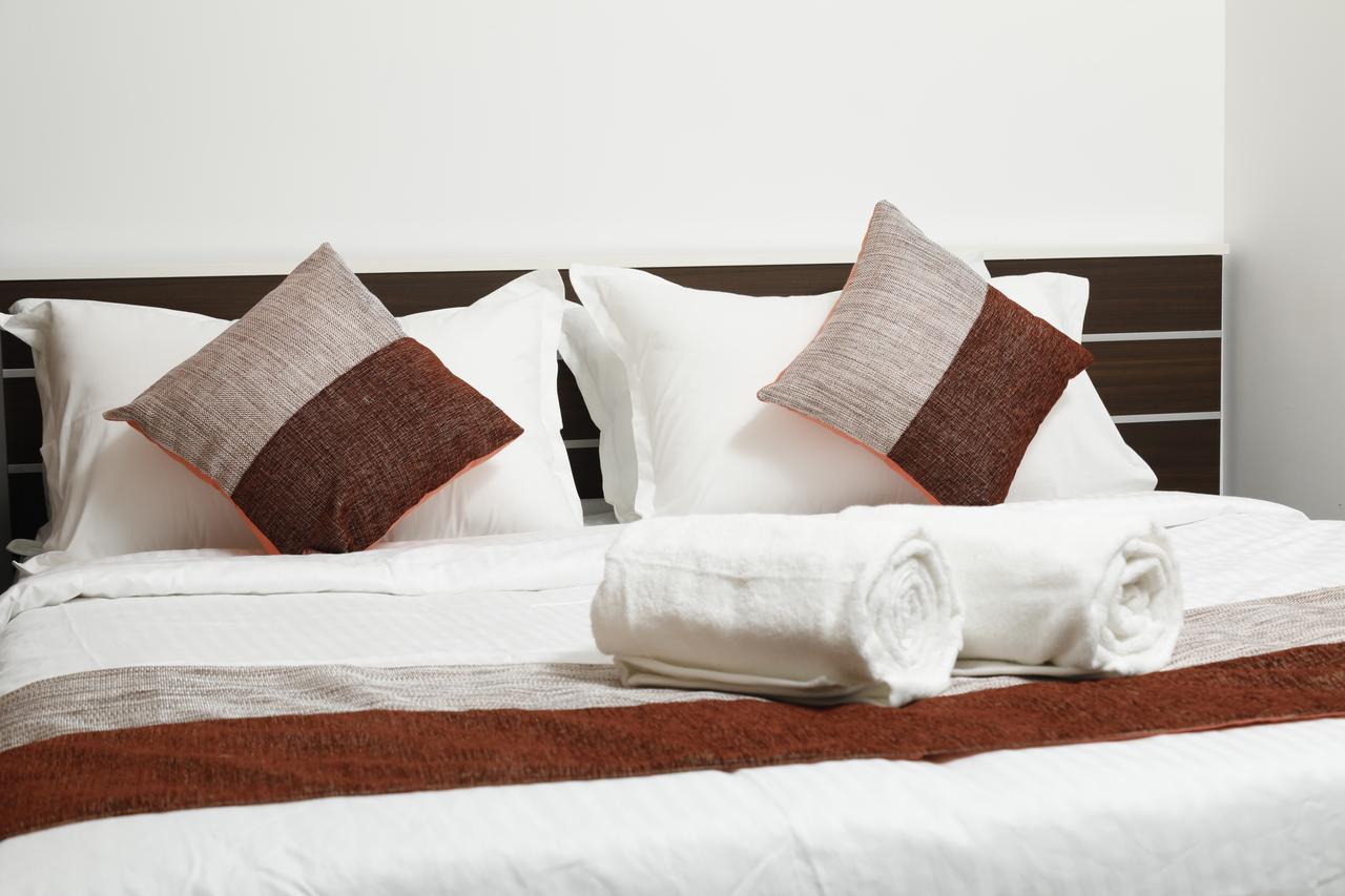 Puthens Clifton Inn Котаям Екстериор снимка